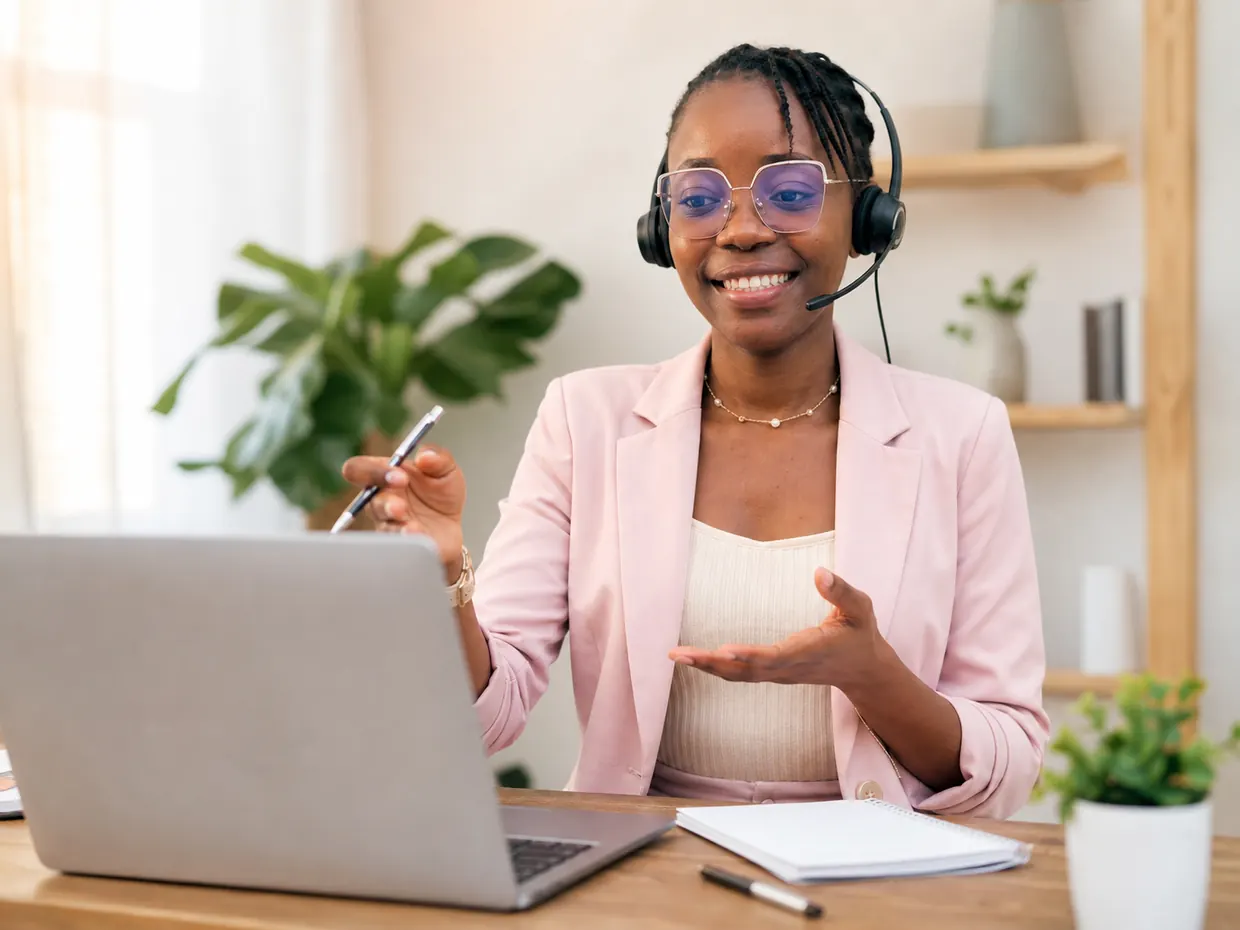 Peace teaching an online lesson from her home workspace